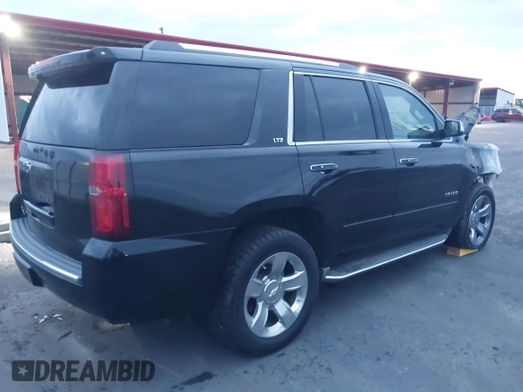 2015 Chevrolet Tahoe LTZ z VIN 1GNSKCKC5FR213209, wystawiony jako IAAI lot #41023368 z przebiegiem Nie podano mil oraz . Historia ofert i sprzedaży dostępna na DreamBid. Obrazek 4.