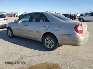 2004 Toyota Camry LE with VIN 4T1BF32K04U574101, listed as a Copart auction lot 47653965 with 0 mi miles and Salvage Title. Bid and sale history available at carsss.com. Image 2.