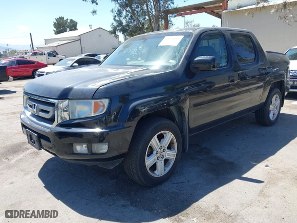 2011 Honda Ridgeline RTL with VIN 5FPYK1F50BB001442, listed as a IAAI auction lot 42023615 with 189,170 mi miles. Bid and sale history available at carsss.com. Image 2.