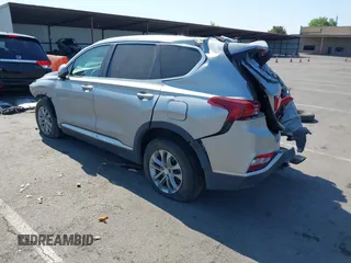 2020 Hyundai Santa Fe SE z VIN 5NMS2CAD1LH221326, wystawiony jako IAAI lot #42442177 z przebiegiem 68 995 mil mil oraz . Historia ofert i sprzedaży dostępna na DreamBid. Obrazek 3.