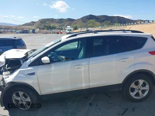 2014 Ford Escape SE with VIN 1FMCU9GX5EUB53378, listed as a IAAI auction lot 41709382 with Not provided miles and . Bid and sale history available at DreamBid. Image 13.