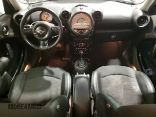 2012 MINI Countryman with VIN WMWZB3C52CWM01672, listed as a Copart auction lot 56064265 with 97,267 mi miles and Salvage Title. Bid and sale history available at DreamBid. Image 8.