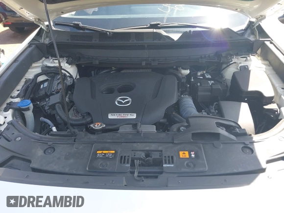 2021 Mazda CX-9 Touring z VIN JM3TCBCYXM0521323, wystawiony jako IAAI lot #42190976 z przebiegiem 56 652 mil mil oraz . Historia ofert i sprzedaży dostępna na DreamBid. Obrazek 10.