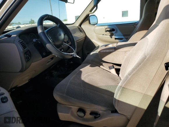 1999 Ford F-150 XL with VIN 1FTRX18L5XKA44484, listed as a Copart auction lot 56232815 with 177,990 mi miles and Salvage title. Bid and sale history available at DreamBid. Image 7.