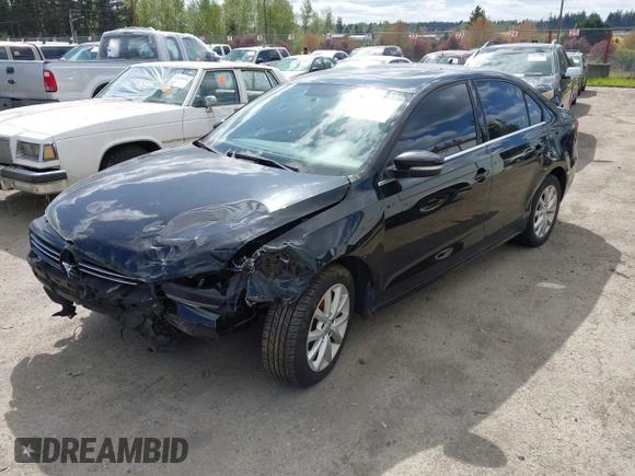 2013 Volkswagen Jetta Sedan SE w/Convenience/Sunroof with VIN 3VWDX7AJ0DM377828, listed as a IAAI auction lot 42081874 with 148,080 mi miles. Bid and sale history available at carsss.com. Image 2.