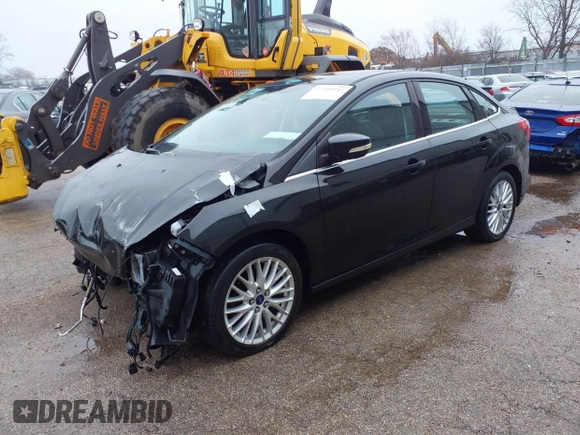 2014 Ford Focus Titanium with VIN 1FADP3J25EL310199, listed as a IAAI auction lot 40682901 with 84,885 mi miles and . Bid and sale history available at DreamBid. Image 2.