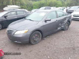 2007 Toyota Camry CE with VIN 4T1BE46K77U129152, listed as a IAAI auction lot 42107149 with 203,722 mi miles and . Bid and sale history available at DreamBid. Image 2.