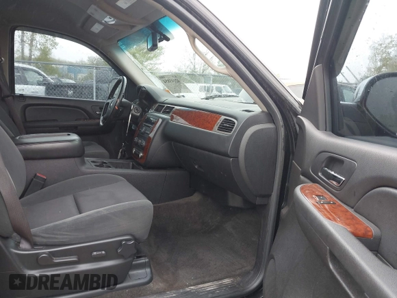 2009 Chevrolet Tahoe 2LT z VIN 1GNFK23009R296956, wystawiony jako IAAI lot #42143854 z przebiegiem 162 156 mil mil oraz . Historia ofert i sprzedaży dostępna na DreamBid. Obrazek 5.