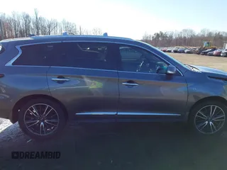 2016 Infiniti QX60 with VIN 5N1AL0MM5GC502404, listed as a IAAI auction lot 41347240 with 133,334 mi miles and . Bid and sale history available at DreamBid. Image 14.