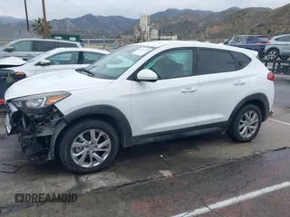 2019 Hyundai Tucson SE with VIN KM8J23A48KU026984, listed as a IAAI auction lot 41767118 with 72,647 mi miles. Bid and sale history available at carsss.com. Image 15.