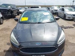 2017 Ford Focus SE with VIN 1FADP3F23HL232809, listed as a IAAI auction lot 42117700 with 104,802 mi miles and . Bid and sale history available at DreamBid. Image 12.
