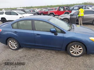 2013 Subaru Impreza Premium z VIN JF1GJAB66DH003999, wystawiony jako IAAI lot #40540006 z przebiegiem Nie podano mil oraz . Historia ofert i sprzedaży dostępna na DreamBid. Obrazek 13.
