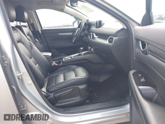 2017 Mazda CX-5 Grand Touring with VIN JM3KFBDL8H0227348, listed as a IAAI auction lot 41572377 with 124,908 mi miles. Bid and sale history available at carsss.com. Image 5.