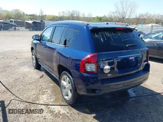 2014 Jeep Compass Latitude with VIN 1C4NJCEB2ED883243, listed as a IAAI auction lot 41989007 with 138,192 mi miles. Bid and sale history available at carsss.com. Image 3.