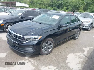 2024 Volkswagen Jetta SE with VIN 3VW7M7BU0RM059133, listed as a IAAI auction lot 42553729 with 13,091 mi miles and . Bid and sale history available at DreamBid. Image 2.