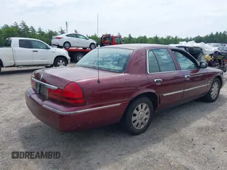 2005 Mercury Grand Marquis LS Premium z VIN 2MEHM75W05X636003, wystawiony jako IAAI lot #42480277 z przebiegiem 224 789 mil mil oraz . Historia ofert i sprzedaży dostępna na DreamBid. Obrazek 4.
