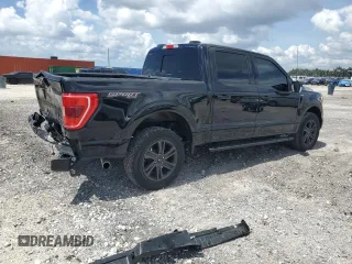 2022 Ford F-150 XL with VIN 1FTFW1E82NFC33590, listed as a Copart auction lot 61806045 with 53,477 mi miles and Salvage title. Bid and sale history available at DreamBid. Image 3.