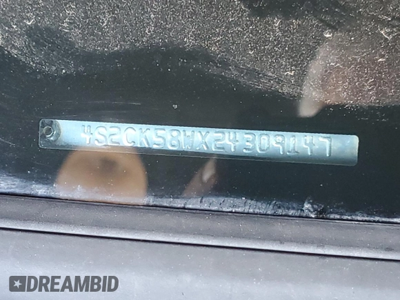 2002 Isuzu Rodeo S with VIN 4S2CK58WX24309147, listed as a Copart auction lot 44266155 with 73,935 mi miles and Salvage Title. Bid and sale history available at DreamBid. Image 14.
