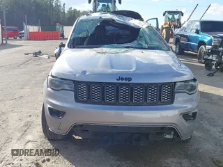 2020 Jeep Grand Cherokee Altitude with VIN 1C4RJEAG8LC430164, listed as a IAAI auction lot 41472197 with 78,078 mi miles and . Bid and sale history available at DreamBid. Image 6.