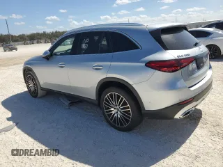 2023 Mercedes-Benz GLC with VIN W1NKM4GB3PF002580, listed as a Copart auction lot 77246444 with 0 mi miles and Salvage Title. Bid and sale history available at carsss.com. Image 2.