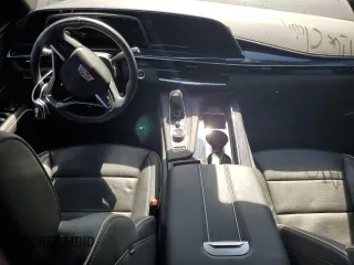 2021 Cadillac Escalade Sport z VIN 1GYS3EKL1MR270077, wystawiony jako Copart lot #74130854 z przebiegiem 21 584 mil mil oraz Szkoda całkowita • Salvage title. Historia ofert i sprzedaży dostępna na DreamBid. Obrazek 8.