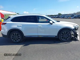 2020 Mazda CX-9 Signature with VIN JM3TCBEY3L0418322, listed as a IAAI auction lot 41723991 with 57,325 mi miles and . Bid and sale history available at carsss.com. Image 13.