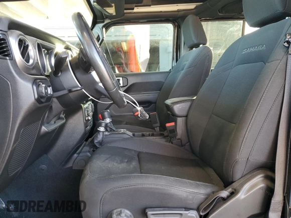 2020 Jeep Wrangler Unlimited Sahara Altitude with VIN 1C4HJXEGXLW292367, listed as a Copart auction lot 88130035 with 52,838 mi miles and Salvage title. Bid and sale history available at DreamBid. Image 7.
