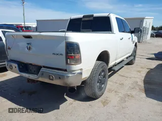 2016 Ram 2500 SLT with VIN 3C6UR5DLXGG209185, listed as a IAAI auction lot 41814628 with 298,573 mi miles. Bid and sale history available at carsss.com. Image 4.