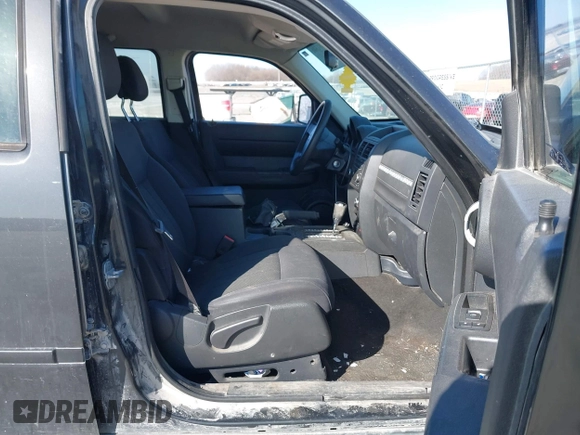 2011 Dodge Nitro SE z VIN 1D4PT2GK7BW520224, wystawiony jako IAAI lot #41781346 z przebiegiem 152 140 mil mil oraz . Historia ofert i sprzedaży dostępna na DreamBid. Obrazek 5.