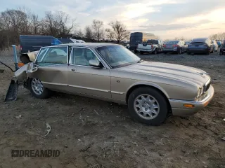 2002 Jaguar XJ 8 with VIN SAJDA14C82LF48116, listed as a Copart auction lot 86444224 with Not provided miles and Salvage title. Bid and sale history available at DreamBid. Image 4.