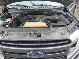2019 Ford F-150 XL with VIN 1FTEW1C56KKC31025, listed as a IAAI auction lot 41452618 with 153,422 mi miles and . Bid and sale history available at DreamBid. Image 10.