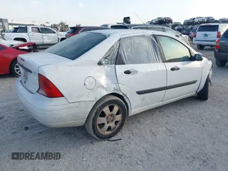2003 Ford Focus LX с VIN 1FAFP33P83W344408, выставлен на аукционе IAAI как лот 42377195 с пробегом 135 732 миль миль и . История ставок и продаж доступна на DreamBid. Изображение 4.