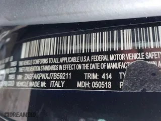 2018 Alfa Romeo Stelvio Sport with VIN ZASFAKPNXJ7B59211, listed as a IAAI auction lot 41099083 with 60,695 mi miles. Bid and sale history available at carsss.com. Image 9.