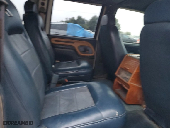1996 GMC Suburban with VIN 1GDEC16R1TJ741423, listed as a Copart auction lot 83225074 with 488,815 mi miles and Salvage Title. Bid and sale history available at carsss.com. Image 11.