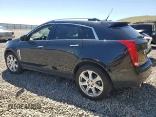 2013 Cadillac SRX Performance Collection z VIN 3GYFNHE37DS519391, wystawiony jako Copart lot #56307695 z przebiegiem 122 294 mil mil oraz Czysty tytuł • Clean title. Historia ofert i sprzedaży dostępna na DreamBid. Obrazek 2.