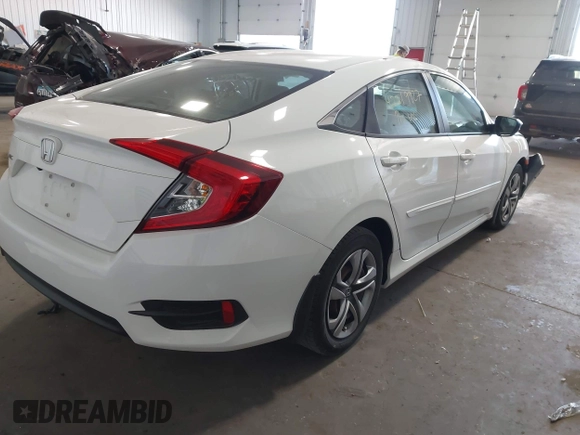 2017 Honda Civic LX with VIN 19XFC2F5XHE007668, listed as a IAAI auction lot 42219927 with 132,444 mi miles and . Bid and sale history available at DreamBid. Image 4.