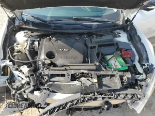 2018 Nissan Maxima SV z VIN 1N4AA6AP2JC404214, wystawiony jako Copart lot #56487975 z przebiegiem 117 276 mil mil oraz Szkoda całkowita • Salvage title. Historia ofert i sprzedaży dostępna na DreamBid. Obrazek 11.