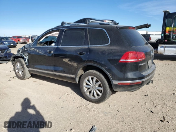 2016 Volkswagen Touareg Sport with VIN WVGEF9BP9GD010964, listed as a Copart auction lot 85800844 with 157,563 mi miles and Salvage Title. Bid and sale history available at DreamBid. Image 2.