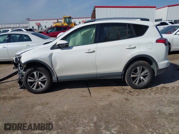 2018 Toyota RAV4 XLE with VIN JTMWFREV7JJ728184, listed as a IAAI auction lot 41377413 with 117,957 mi miles. Bid and sale history available at carsss.com. Image 13.