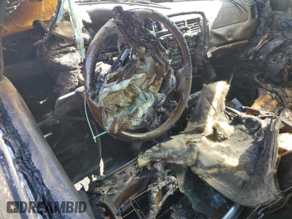 1999 Toyota Tacoma z VIN 4TAWN72N4XZ467999, wystawiony jako Copart lot #60542855 z przebiegiem Nie podano mil oraz Szkoda całkowita • Salvage title. Historia ofert i sprzedaży dostępna na DreamBid. Obrazek 8.
