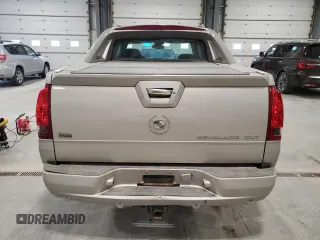 2004 Cadillac Escalade EXT z VIN 3GYEK62NX4G273082, wystawiony jako Copart lot #54826215 z przebiegiem 251 075 mil mil oraz Szkody całkowita. Historia ofert i sprzedaży dostępna na DreamBid. Obrazek 6.