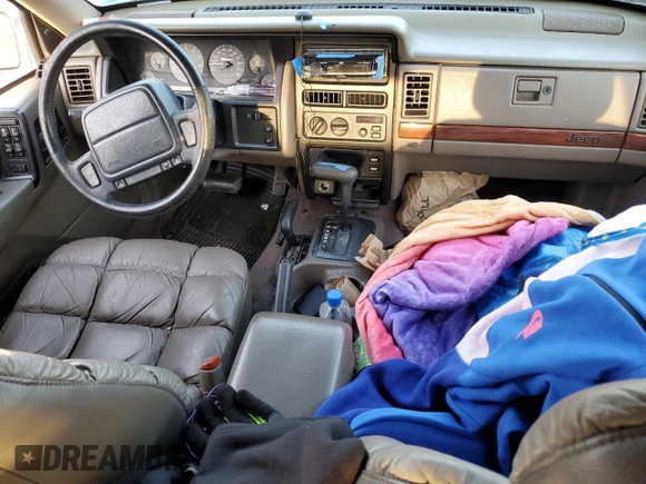 1995 Jeep Grand Cherokee Limited with VIN 1J4GZ78Y2SC603292, listed as a Copart auction lot 84449764 with 153,673 mi miles and Non Repairable. Bid and sale history available at carsss.com. Image 8.