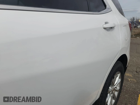 2021 Chevrolet Equinox LT with VIN 3GNAXTEV0ML386912, listed as a IAAI auction lot 42189184 with 61,925 mi miles and . Bid and sale history available at DreamBid. Image 1.