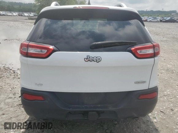 2014 Jeep Cherokee Latitude with VIN 1C4PJLCS3EW249262, listed as a Copart auction lot 56489135 with 195,264 mi miles and Clean Title. Bid and sale history available at DreamBid. Image 6.