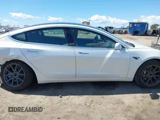 2020 Tesla Model 3 Standard Range Plus with VIN 5YJ3E1EA4LF644967, listed as a IAAI auction lot 41745984 with 23,479 mi miles and . Bid and sale history available at DreamBid. Image 14.