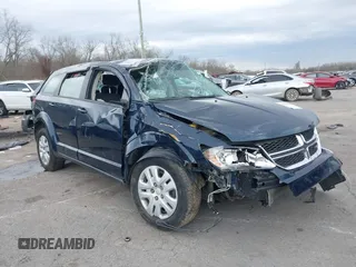 2013 Dodge Journey SE with VIN 3C4PDCAB7DT701180, listed as a IAAI auction lot 41609700 with 118,207 mi miles. Bid and sale history available at carsss.com. Image 1.
