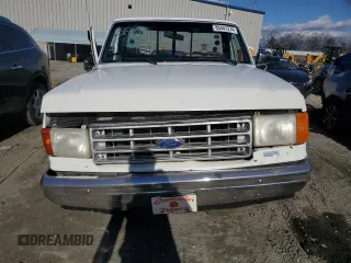 1987 Ford F-150 with VIN 1FTCF15Y7HNA56371, listed as a Copart auction lot 85441274 with 76,200 mi miles and Salvage Title. Bid and sale history available at carsss.com. Image 5.