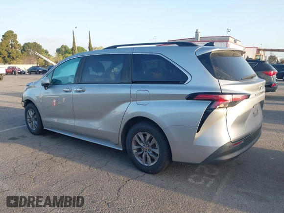 2021 Toyota Sienna XLE with VIN 5TDYRKEC2MS074448, listed as a IAAI auction lot 41946030 with 122,509 mi miles and . Bid and sale history available at DreamBid. Image 14.