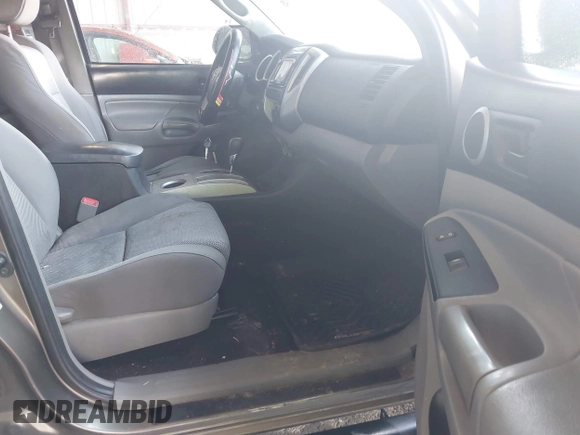 2014 Toyota Tacoma with VIN 3TMMU4FN4EM072128, listed as a IAAI auction lot 42479725 with 287,877 mi miles and . Bid and sale history available at DreamBid. Image 5.