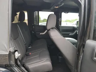 2016 Jeep Wrangler Unlimited Sahara with VIN 1C4BJWEG8GL150249, listed as a Copart auction lot 57574525 with 104,206 mi miles and Salvage title. Bid and sale history available at DreamBid. Image 11.